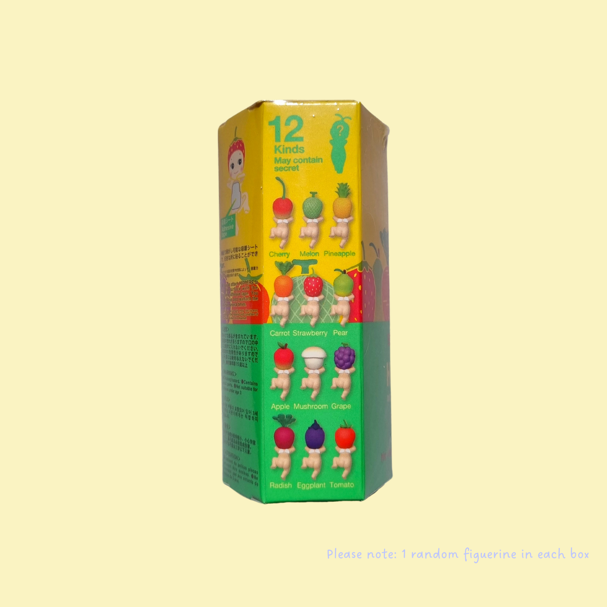 Backview of blind box of fruit series Sonny Angel hipper on a pale yellow background. Box has view of all possible collectables inside 
